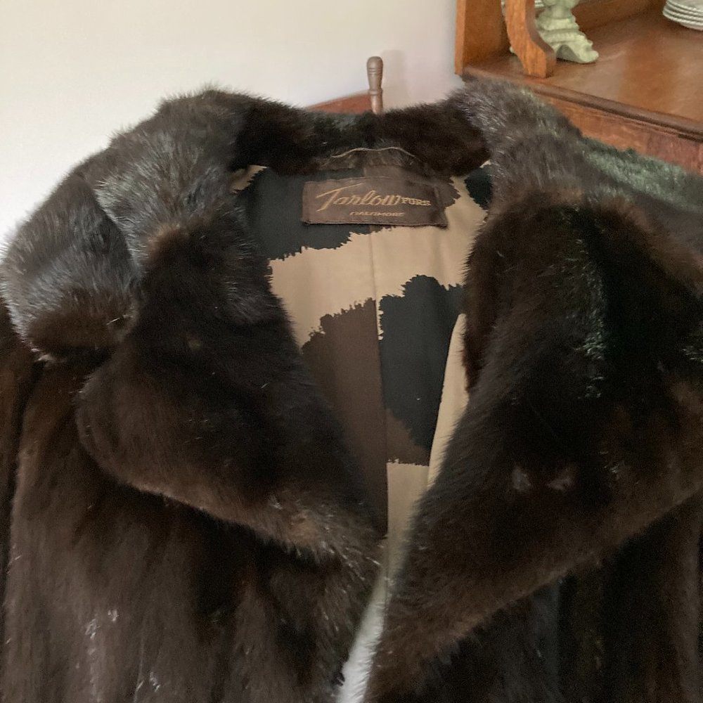 Womens full length mink coat with black leather tie belt